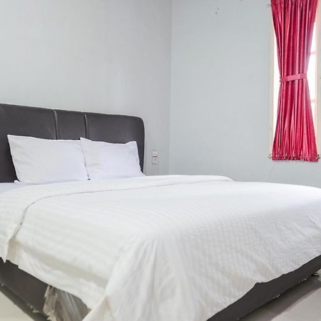 Djaboerigin Mongonsidi Guest House Redpartner Медан Экстерьер фото