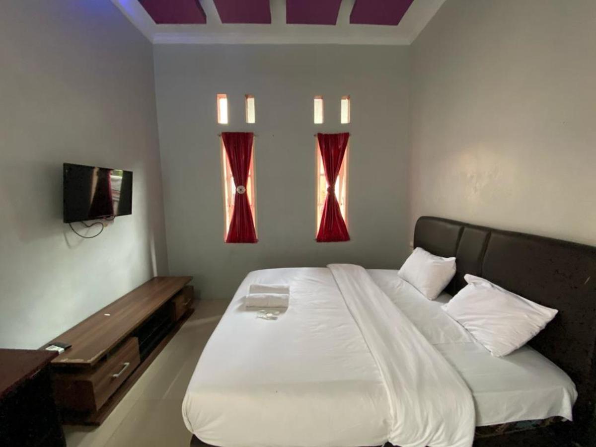 Djaboerigin Mongonsidi Guest House Redpartner Медан Экстерьер фото