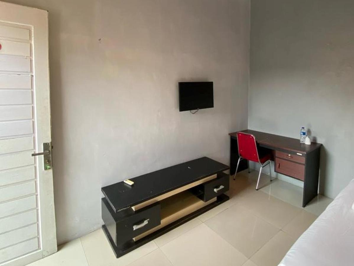 Djaboerigin Mongonsidi Guest House Redpartner Медан Экстерьер фото