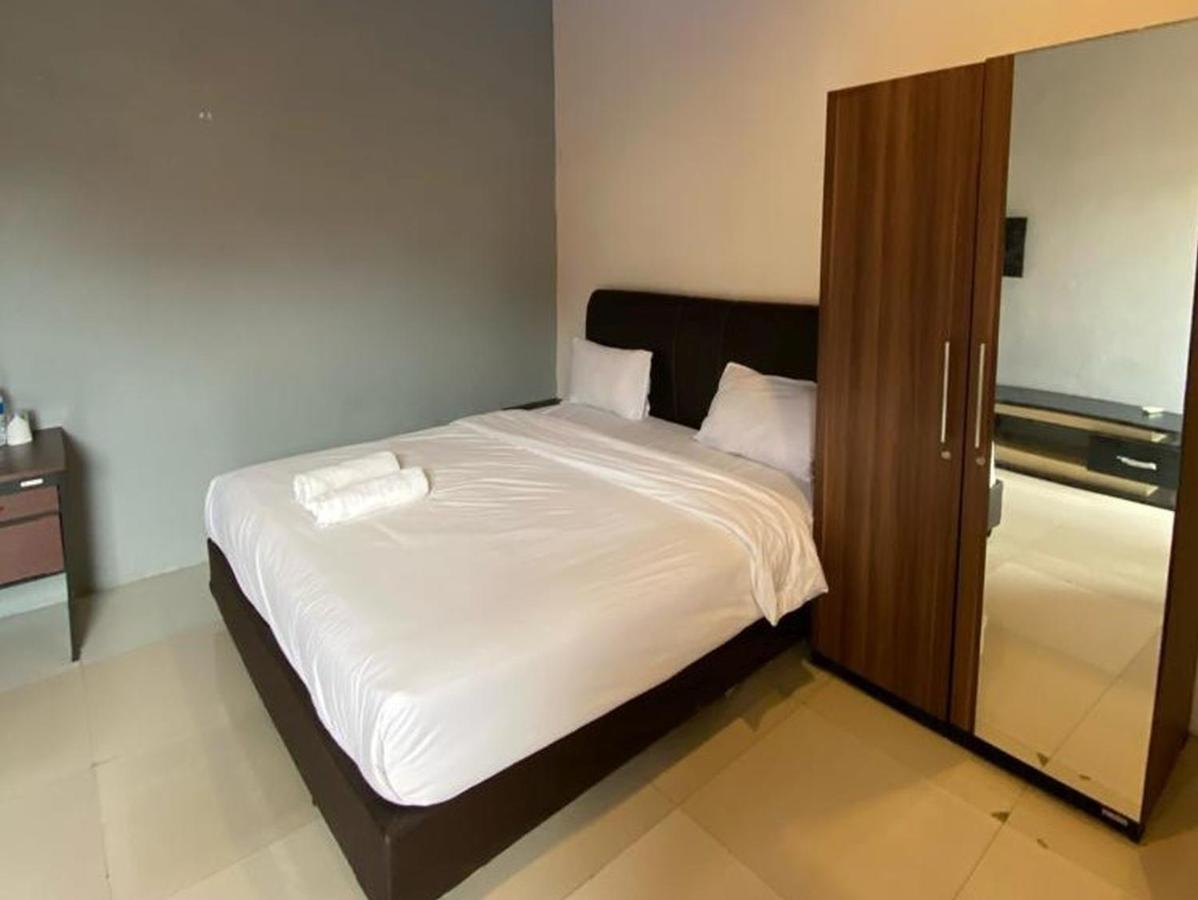 Djaboerigin Mongonsidi Guest House Redpartner Медан Экстерьер фото