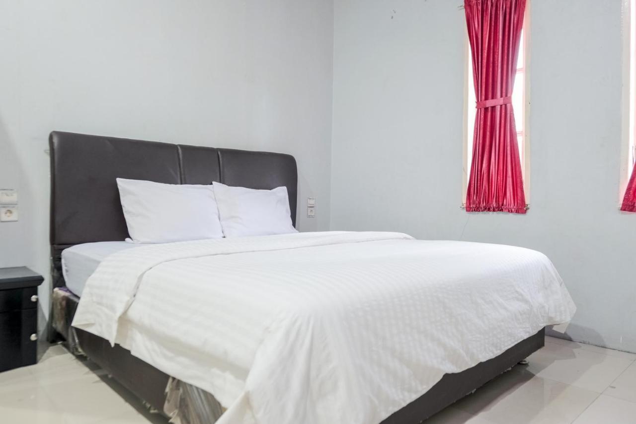 Djaboerigin Mongonsidi Guest House Redpartner Медан Экстерьер фото