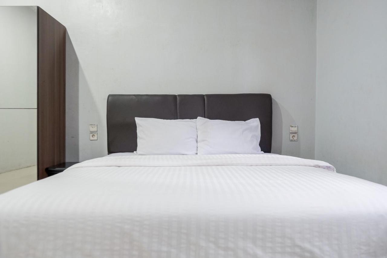 Djaboerigin Mongonsidi Guest House Redpartner Медан Экстерьер фото
