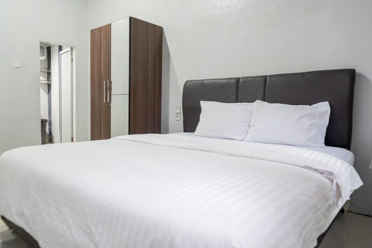 Djaboerigin Mongonsidi Guest House Redpartner Медан Экстерьер фото
