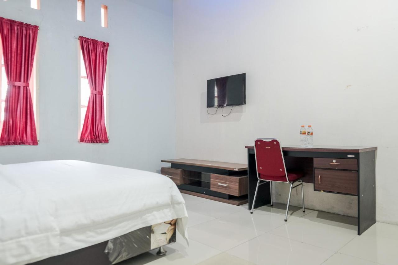 Djaboerigin Mongonsidi Guest House Redpartner Медан Экстерьер фото